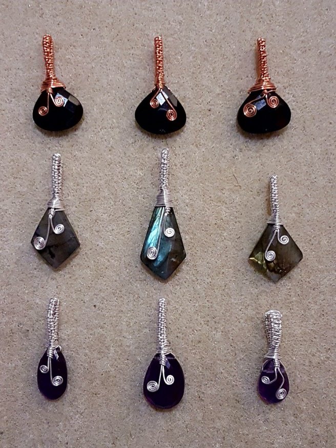 Black spinel, labradorite, and amethyst wire-wrapped pendants